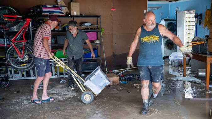 Puketapu locals clear out their homes after Cyclone Gabrielle. Photo / Mark Mitchell