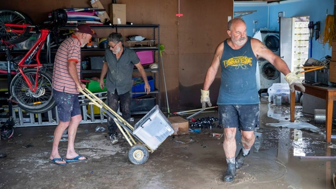 Puketapu locals clear out their homes after Cyclone Gabrielle. Photo / Mark Mitchell