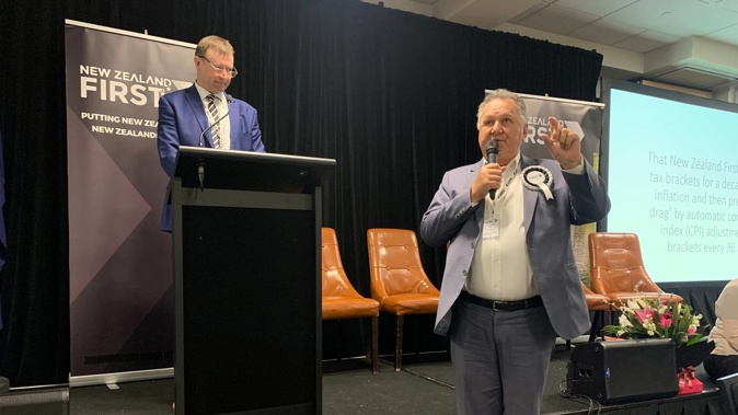 NZ First former MP Shane Jones speaks to a remit under the eye of another former MP Mark Patterson at the party's conference in Christchurch. Photo / Adam Pearse