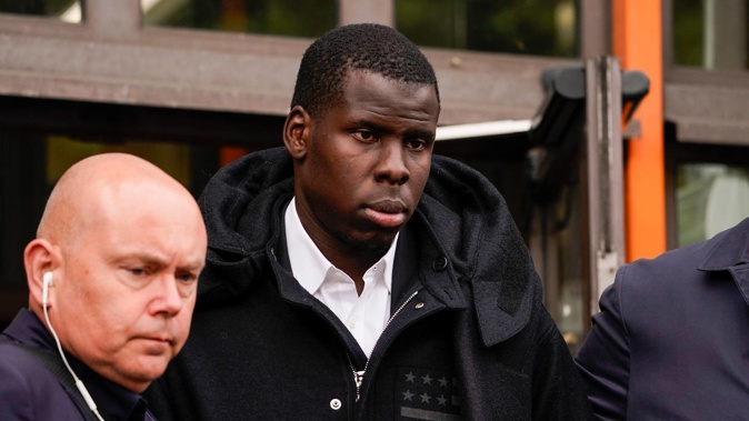 West Ham United player Kurt Zouma leaves Thames Magistrates Court after a hearing, in London. Photo / AP