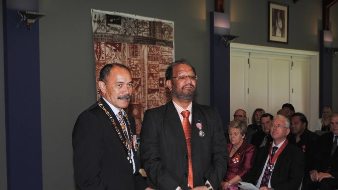 Former Governor General Sir Jerry Mataparae with Davinder Singh Rahal (right) as he receives the Queen's Service Medal for services to the Indian community in 2012. Photo / Supplied