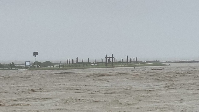 Ātea A Rangi seen from afar at high tide on the morning of February 14.