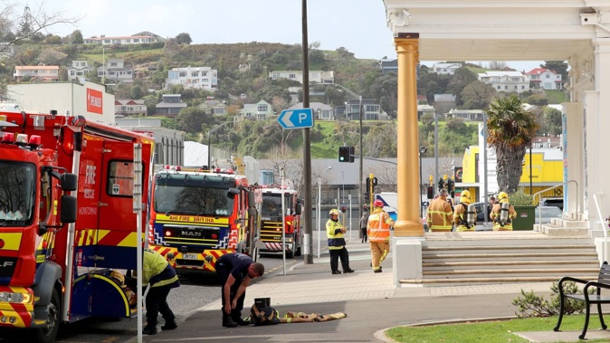 Firefighters prepare to enter the Opera House. (Photo / Bevan Conley)