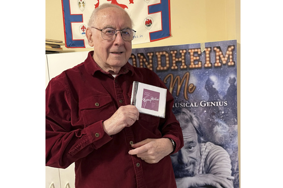 Author and journalist Paul Salsini holds a copy of Stephen Sondheim's first original cast recording of “Phinney's Rainbow” in Milwaukee on Dec. 1, 2022. The CD, which was lost, is a recording of the legendary composer's first student-led musical while he attended Williams College in 1948. Photo / AP