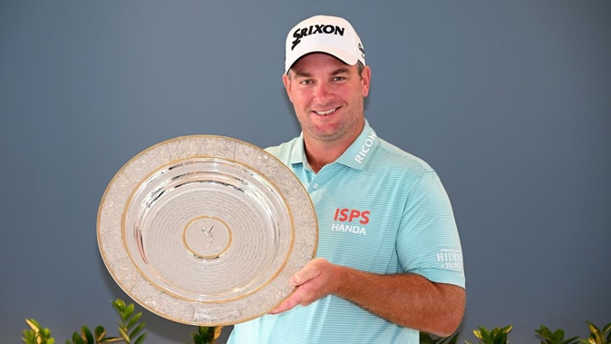 Ryan Fox holds the Seve Ballesteros Award trophy for 2022. Photo / Getty