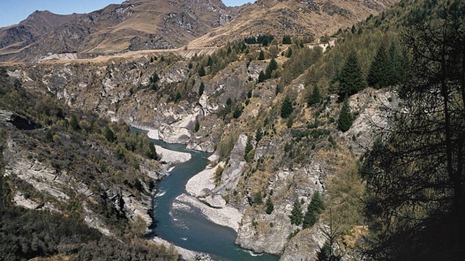 The Shotover River winds its way through Skippers Canyon, surrounded by mountain peaks and gorges. Photo / Getty Images