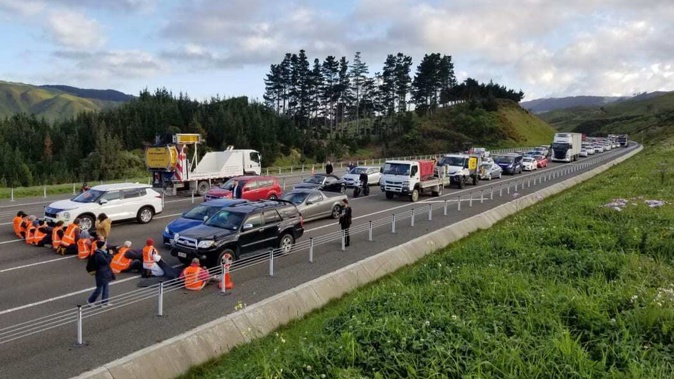 Protesters block traffic on Transmission Gully, Wellington. Photo / RNZ