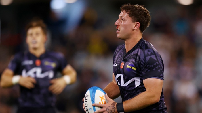 Riley Higgins of the Hurricanes in action during the round 11 Super Rugby Pacific match between ACT Brumbies and Hurricanes at GIO Stadium, on April 26, 2025, in Canberra, Australia. (Photo by Mark Nolan/Getty Images)