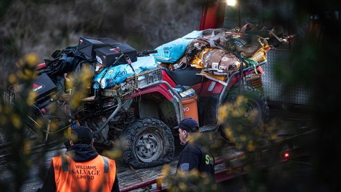 The quad bike used by Tom Phillips as a getaway vehicle before he engaged in a shootout with police, where he was fatally shot, has been removed from the Te Anga Road crime scene. Photo / Hayden Woodward