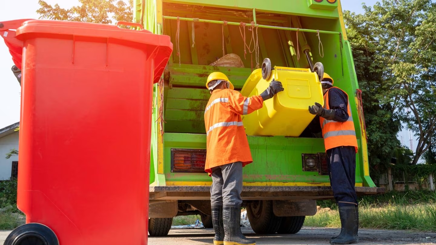 A truck driver sacked for writing the 'f-word' on householders' recycling bins has been awarded compensation. Photo / 123RF