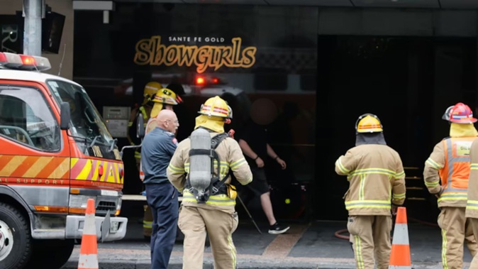 Firefighters respond to a fire in Auckland strip club Showgirls. Photo / Alex Burton