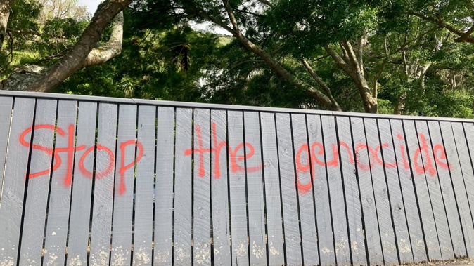 ‘Free Gaza’ and ‘Stop the genocide’ have been painted in red on the fence outside Premier House in Thorndon, Wellington. Photo / Katrina Bennett