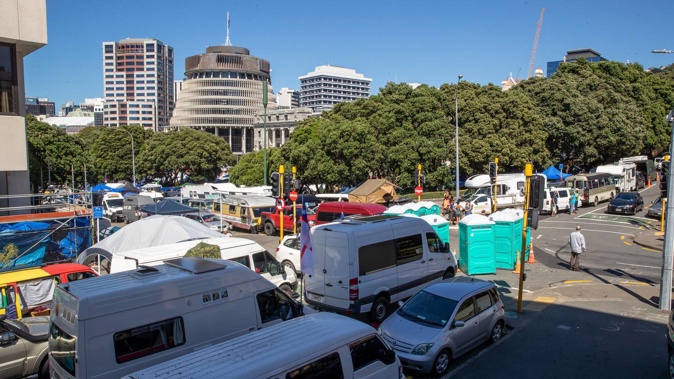 Portaloos and protesters' vehicles parked on the corner of Aitkin, Molesworth and Hill Sts. Photo / Mark Mitchell
