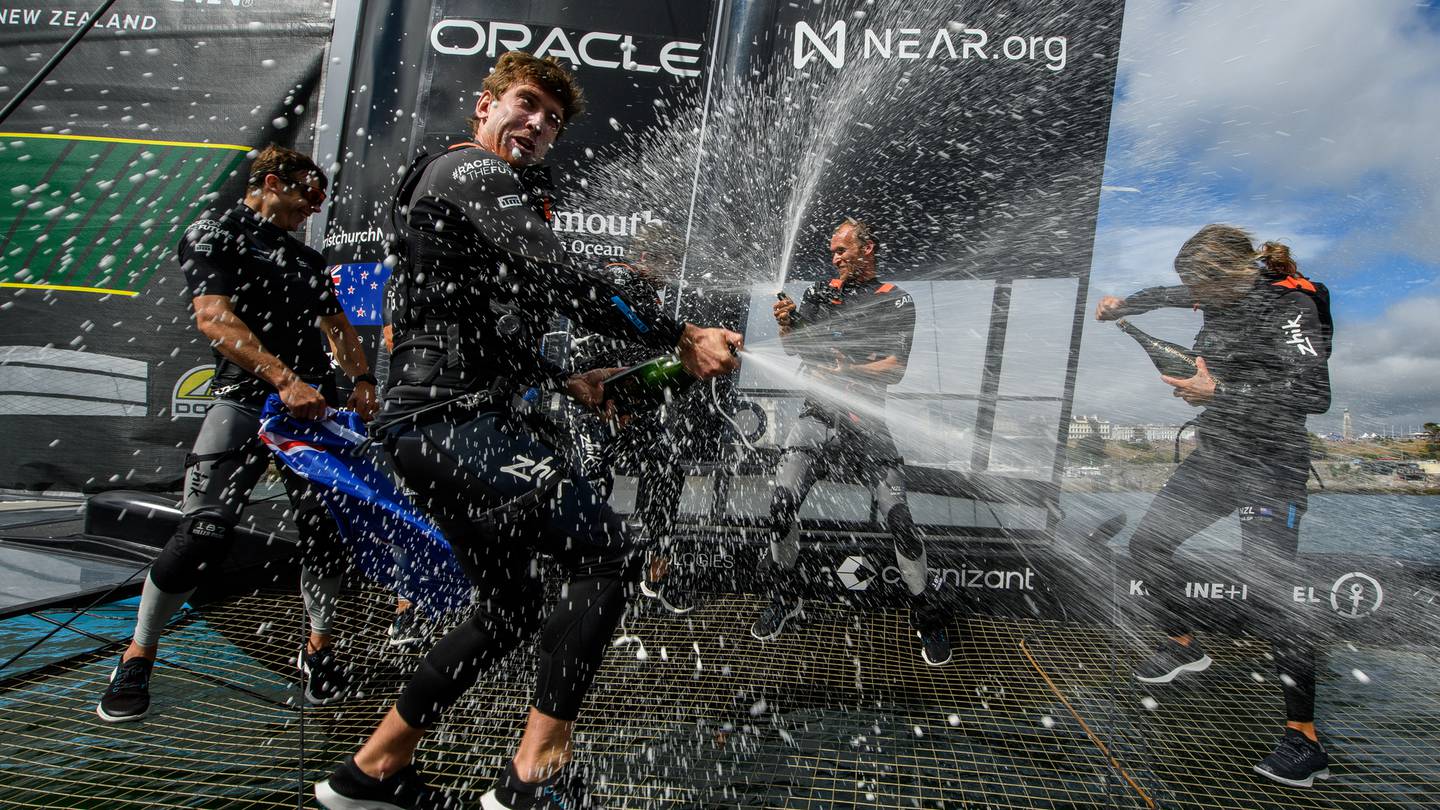 The New Zealand SailGP Team celebrate their first event win in Plymouth, England. Photo: Ricardo Pinto/SailGP