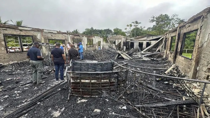 The dormitory of a secondary school is burned in Mahdia, Guyana. Photo / Guyana's Department of Public Information
