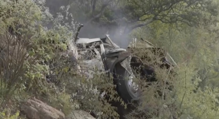 A bus carrying worshippers headed to an Easter festival pluged off a bridge on a mountain pass and burst into flames in South Africa on Thursday, killing at least 45 people, authorities said. Photo / AP