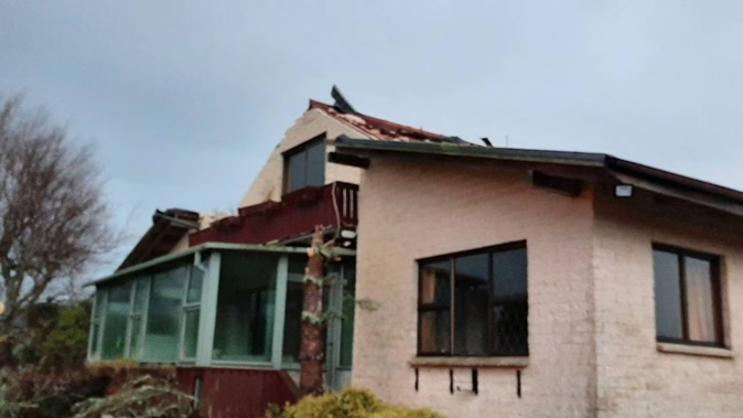 Taranaki woman Jody Thomas awakened early this morning to find a tornado had lifted part of her Awatuna home's roof off. Photo / Jody Thomas