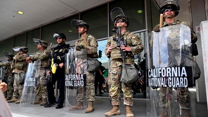 California National Guard stand guard as protesters gather in front of the Edward R. Roybal Federal Building during the 'No Kings' protests Day in Los Angeles on Saturday, June 14, 2025.(Photo by Keith Birmingham/MediaNews Group/Pasadena Star-News via Getty Images)