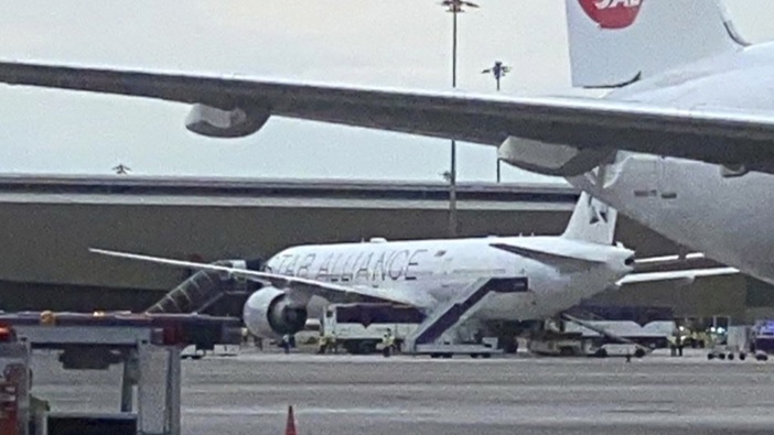 The Boeing 777-300ER aircraft of Singapore Airlines, flight SQ321 from Heathrow is seen on tarmac after requesting an emergency landing at Bangkok's Suvarnabhumi International airport, Thailand, Tuesday, May 21, 2024. Photo / Pongsakorn Rodphai via AP