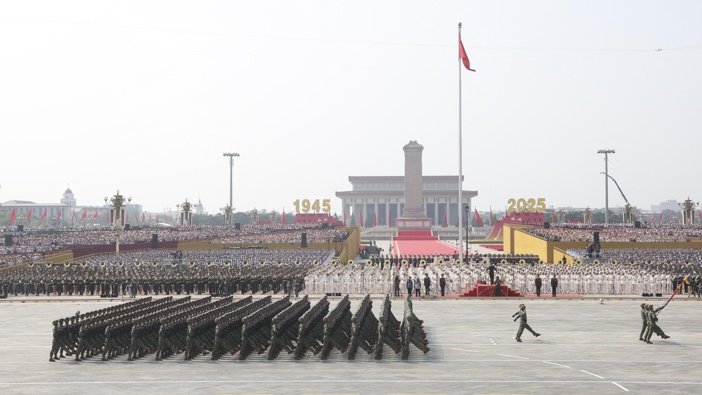 The formation of the People's Liberation Army's Aerospace Force marches through Tiananmen Square. Photo / AFP
