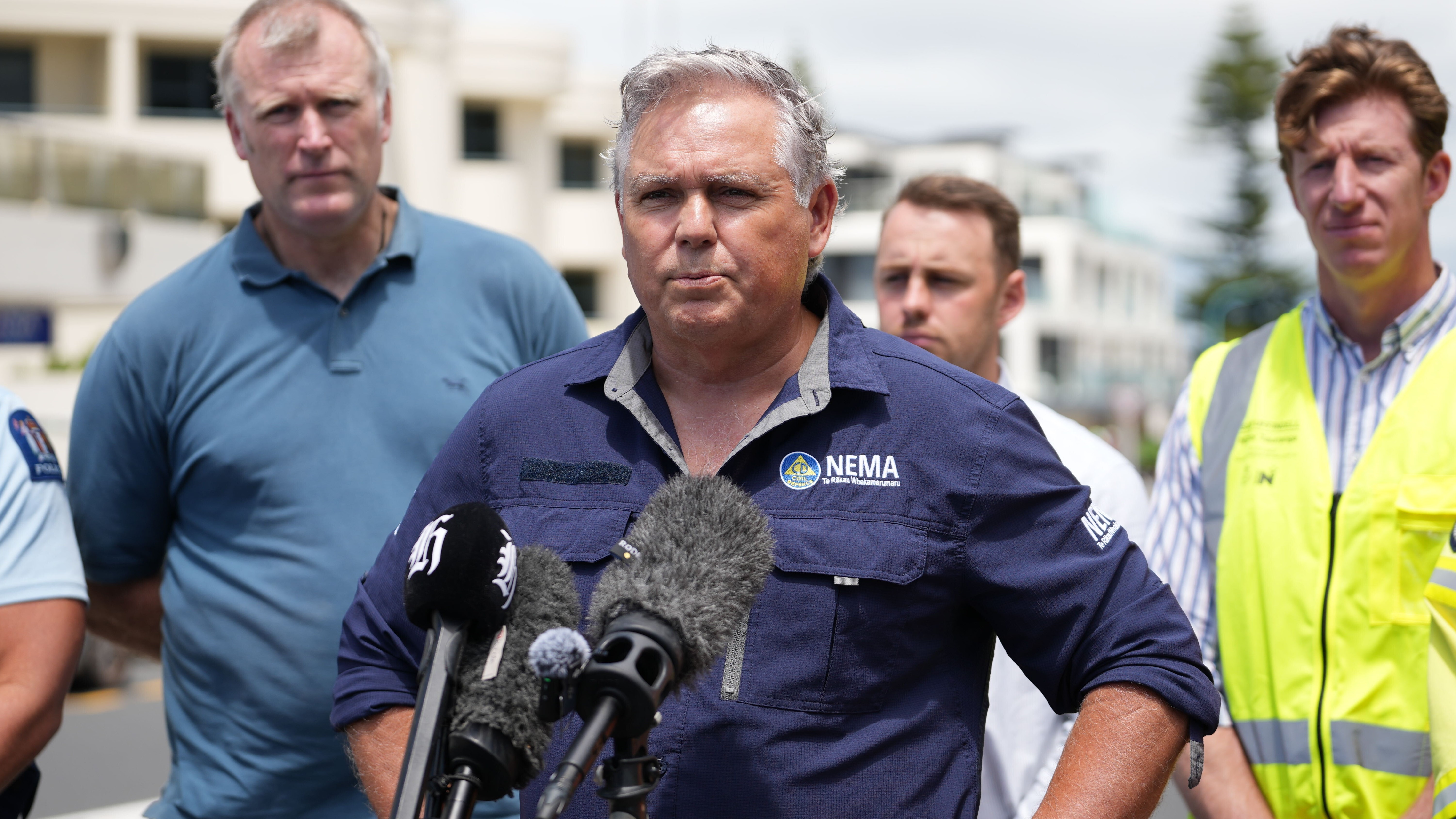 Emergency Management Minister Mark Mitchell holds a stand up at Mount Maunganui Beachside Holiday Park in Mount Maunganui following a major landslide, with reports that multiple people are unaccounted for. Photo / Alyse Wright.