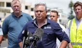 Emergency Management Minister Mark Mitchell holds a stand up at Mount Maunganui Beachside Holiday Park in Mount Maunganui following a major landslide, with reports that multiple people are unaccounted for. Photo / Alyse Wright.