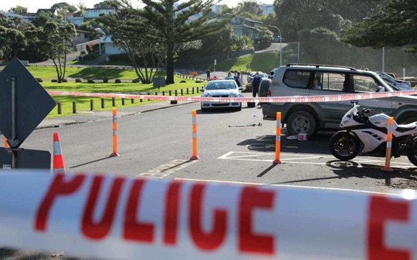 A Murrays Bay woman says she had to run screaming and calling for help after a man chased her off the beach with a "big knife" during a mass stabbing on June 23. Photo / NZME