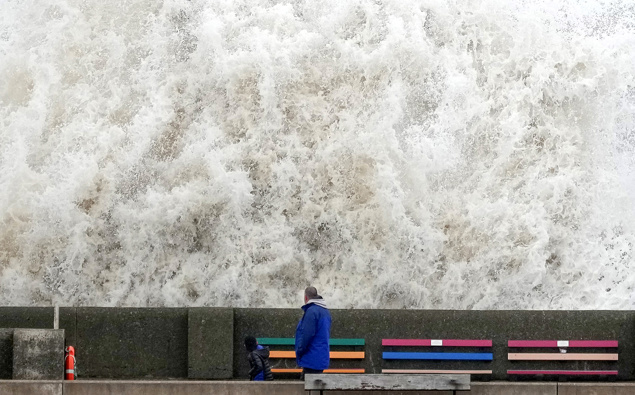 Waves crash into a sea wall in Liverpool, England, on February 17. A rare red alert has been issued as the UK braces for storm Eunice. (Photo / Getty Images)