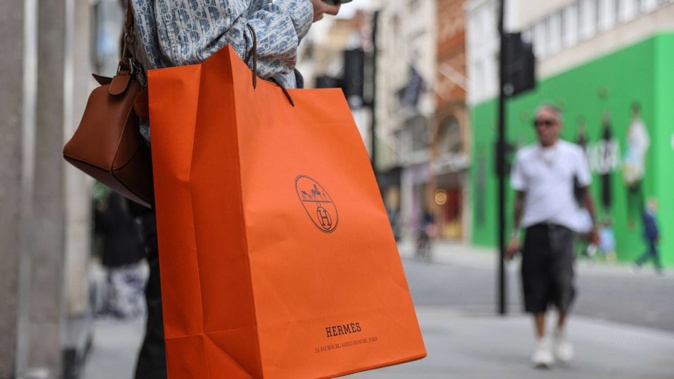 Young women spend more money on retail while men spend more on transport, eating out and entertainment. Photo / Bloomberg