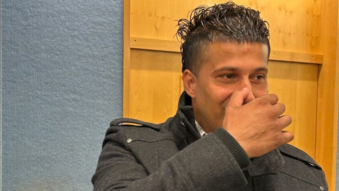 Hamilton man Abdul Javed, 25, was not keen on having his photo taken in the Hamilton District Court today during his sentencing before Judge Arthur Tompkins. Photo / Belinda Feek