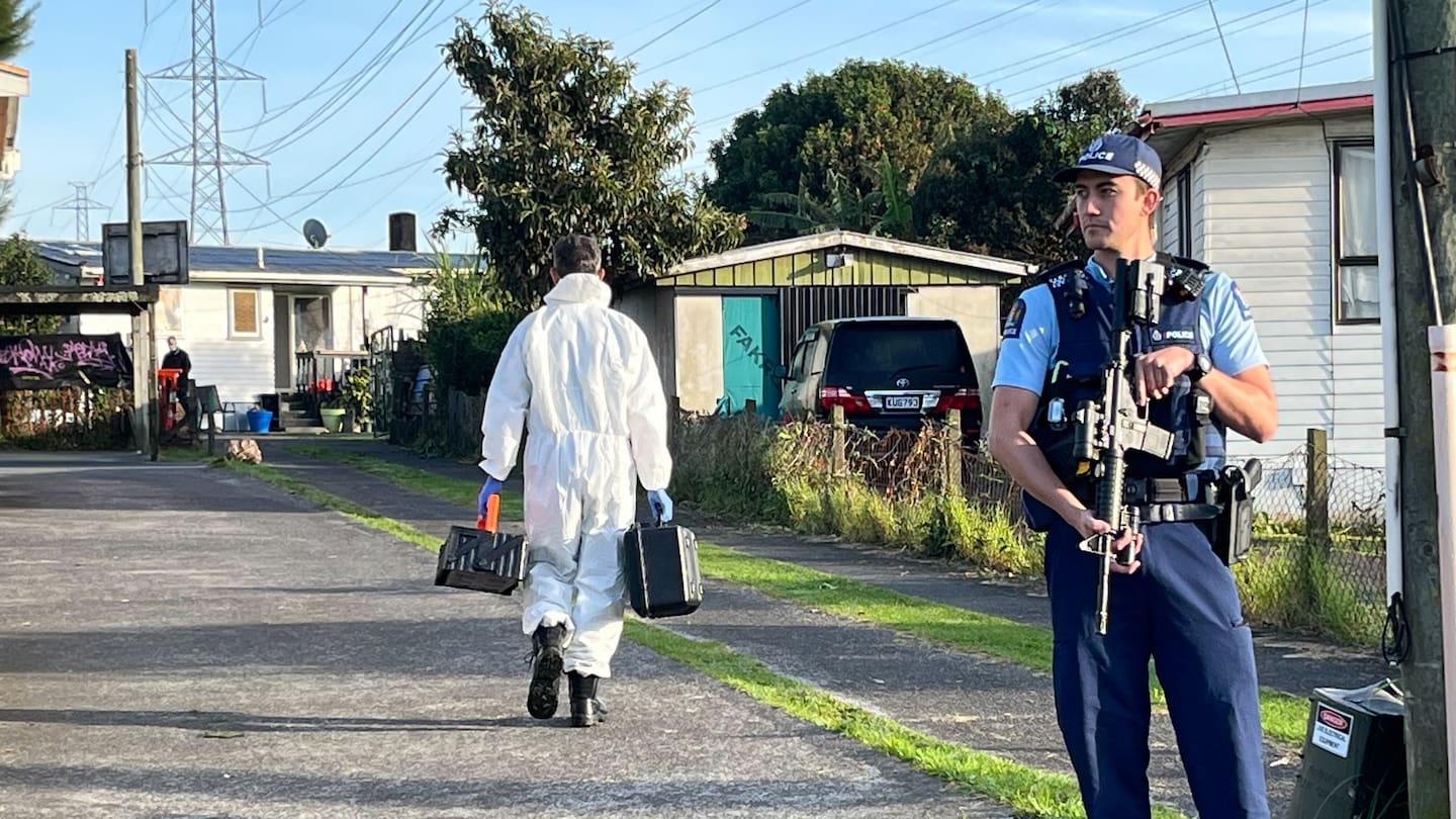 Armed police guard home, specialists examine property, after person seriously injured