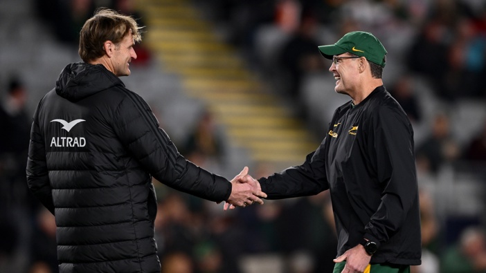 Scott Robertson (left) and Rassie Erasmus greet each other ahead of last week's test at Eden Park. Photo / Getty Images