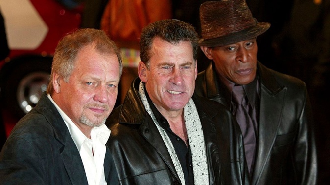 David Soul, left, Paul Michael Glaser, and Antonio Fargas, right, stars of the original 1970's Starsky and Hutch TV series, arrive at the British premiere of the new movie of the same name, in London, on March 11, 2004. Soul, who starred as Hutch in the popular 1970s series, has died aged 80. Photo / AP