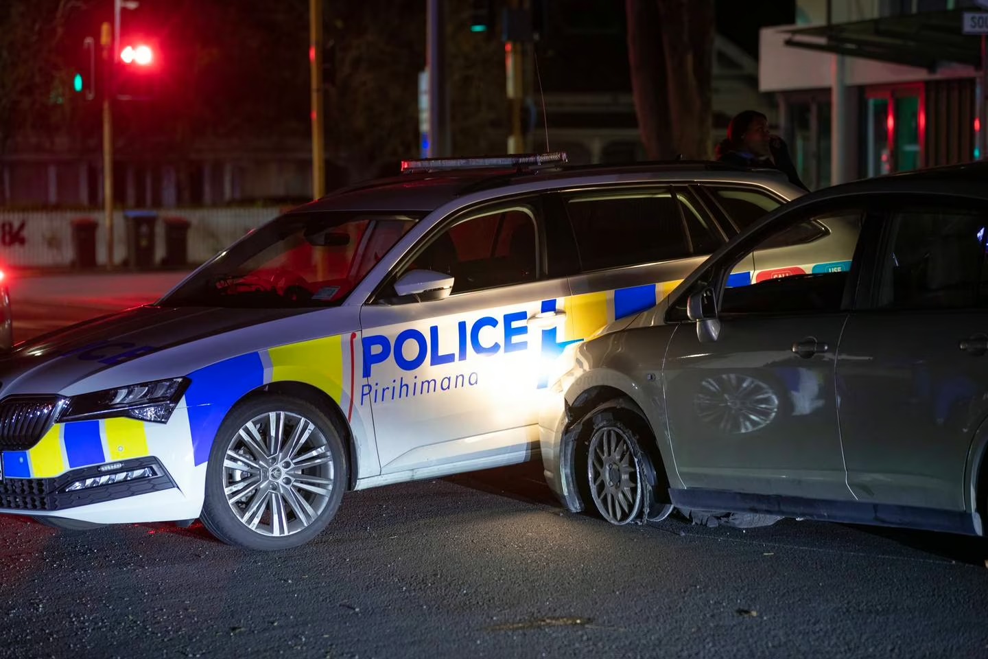 A police car was damaged after helping to stop a vehicle in Epsom. Photo / Hayden Woodward