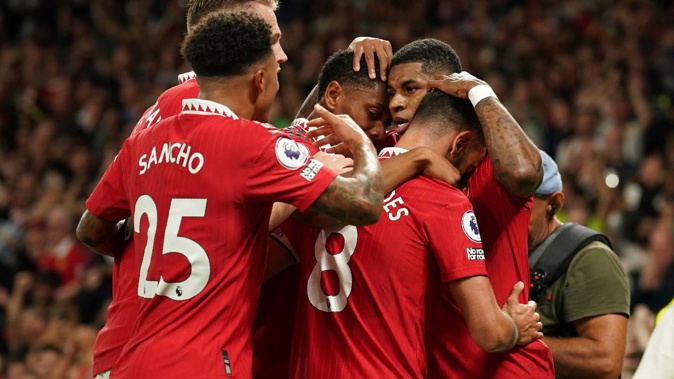 Manchester United's Marcus Rashford celebrates with his teammates after scoring. Photo / AP
