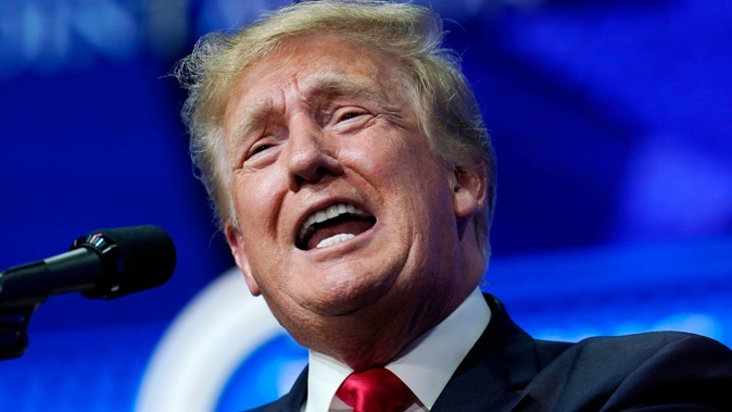 Former President Donald Trump says 'woke means you lose... and our soccer team certainly has'. (Photo / Ross D. Franklin, AP)