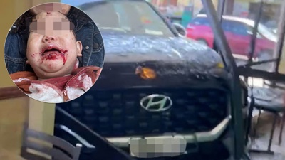 'Her face was covered in blood': Mum, baby showered in glass when car crashed into eatery