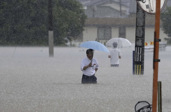 Scientists have long warned that more extreme rainfall is expected in a warming world. (Kyodo News via AP)
