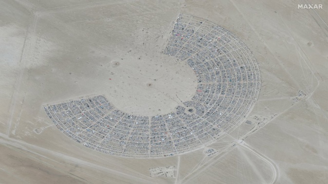 A satellite view shows an overview of the 2023 Burning Man festival, in Black Rock Desert, Nevada on August 28, 2023. Maxar Technologies/Reuters