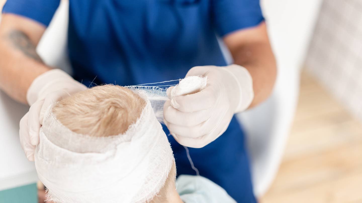 The daycare centre owner is accused of not letting staff take a child who needed stitches in his head to get medical attention. Photo / 123rf