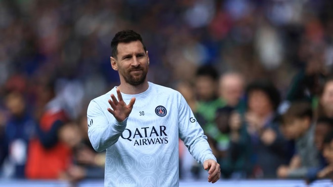 PSG's Lionel Messi gestures as he warms up before the French League One soccer match between Paris Saint-Germain and Lorient. Photo / AP