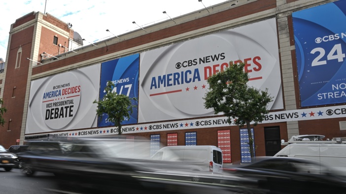 A large banner hangs outside CBS Studios promoting the Vice Presidential Debate on September 30, 2024 in New York, N.Y. Gov. Tim Walz and Sen. JD Vance (R-Ohio) will square off during the Vice Presidential Debate at CBS Studios on Tuesday night. (Photo by Ricky Carioti/The Washington Post via Getty Images)