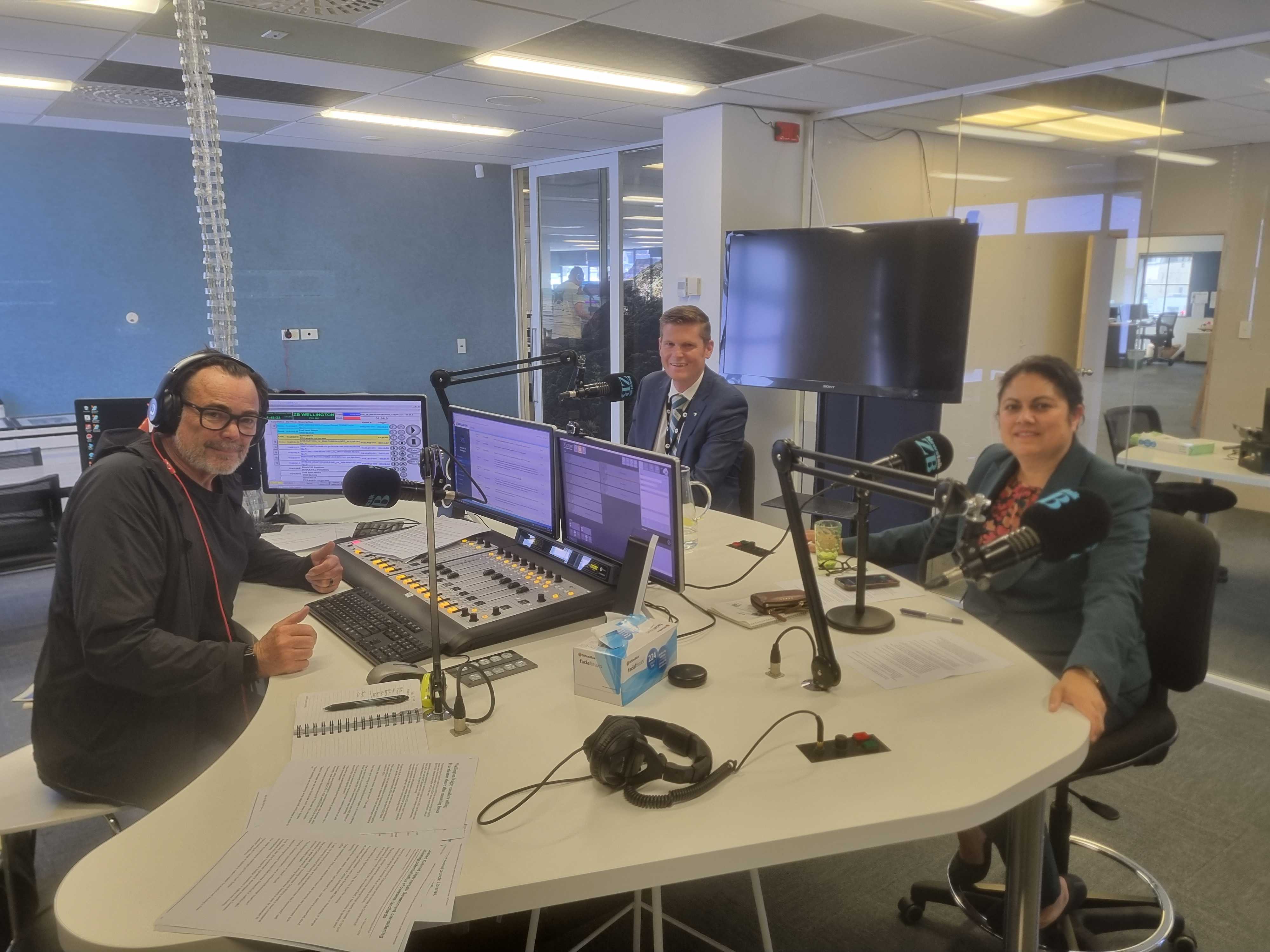 National's Tim Costley and Labour's Ayesha Verrall in studio with Nick Mills