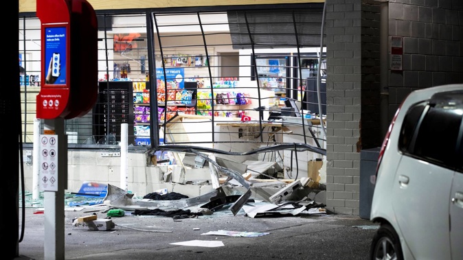 The scene of a ram raid at a petrol station in Oratia, West Auckland. Photo / Hayden Woodward