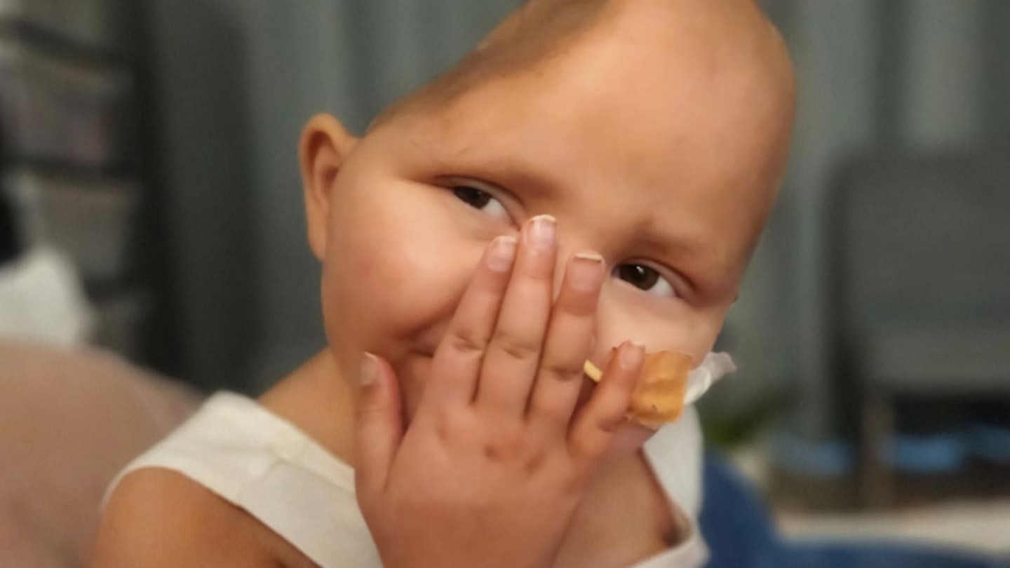 Three-year-old Daisy Nicholls, of Whangarei, had part of her skull removed to treat a rare and aggressive neuroblastoma tumour sitting on her brain stem. Photo / Supplied