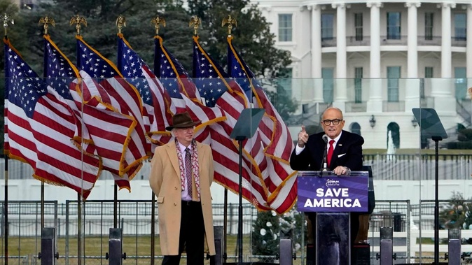 Rudy Giuliani (right) is among those saying they are being indicted for their work as Donald Trump’s attorneys. Photo / AP