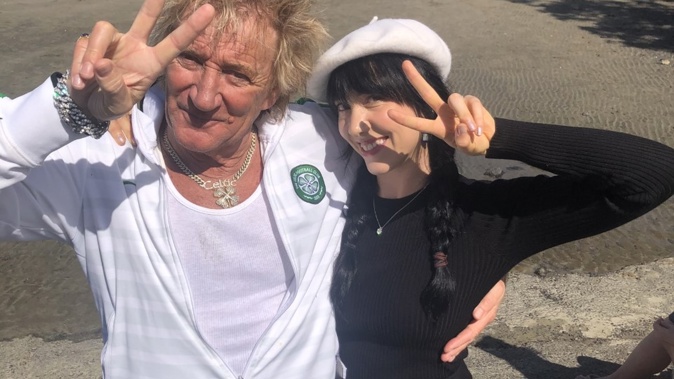 Rod Stewart and Takapuna Beach Cafe staff member Tahlia Leighton on Auckland's Takapuna Beach. Photo / Takapuna Beach Cafe staff