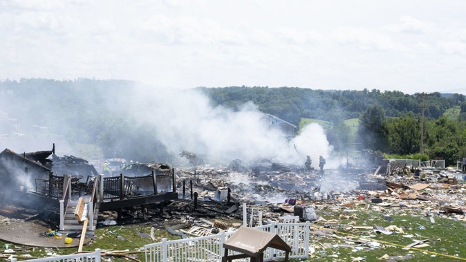 The smouldering wreckage of the three houses that exploded near Rustic Ridge Dr and Brookside Dr in Plum, Pennsylvania on August 12. Photo / AP