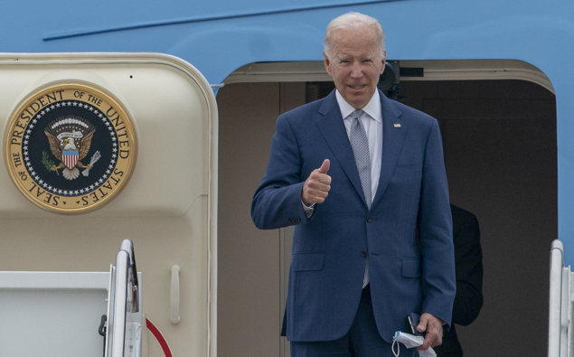 US President Joe Biden gestures as he boards Air Force One. Photo / AP