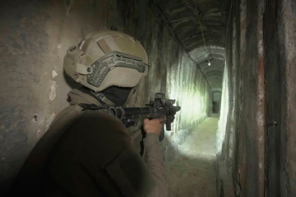 Israeli soldiers in an underground tunnel found underneath Shifa Hospital in Gaza. Photo / AP